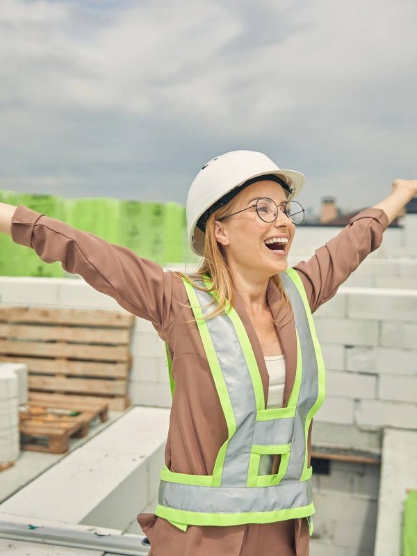 female-contractor-admiring-a-new-construction-object-r2cjuaophclidiui2gc257uy4ynlpzciu5dqmlo6rk